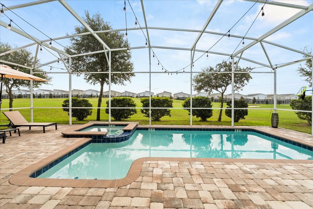Photo of 851 Pebble Beach Drive, Davenport, FL 33896 (MLS # S5135888)