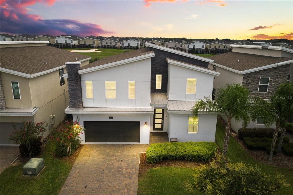 Photo of 851 Pebble Beach Drive, Davenport, FL 33896 (MLS # S5135888)