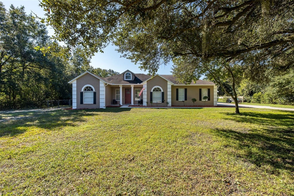 Photo of 31524 Cross Creek Lane, Wesley Chapel, FL 33543 (MLS # TB8557412)