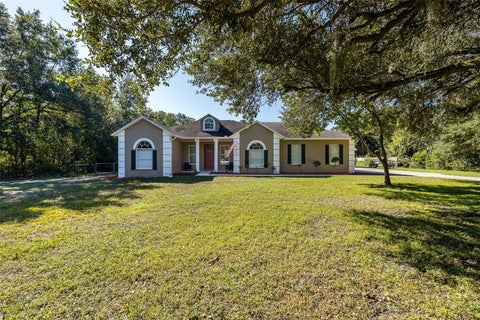 Photo of 31524 Cross Creek Lane, Wesley Chapel, FL 33543 (MLS # TB8557412)