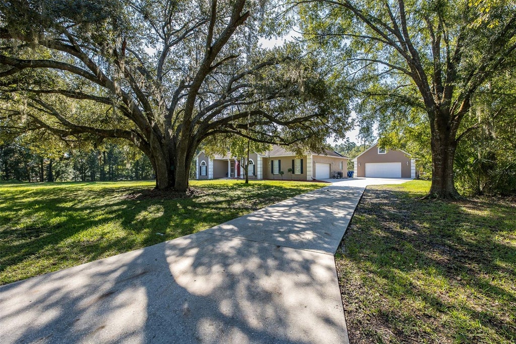 Photo of 31524 Cross Creek Lane, Wesley Chapel, FL 33543 (MLS # TB8557412)