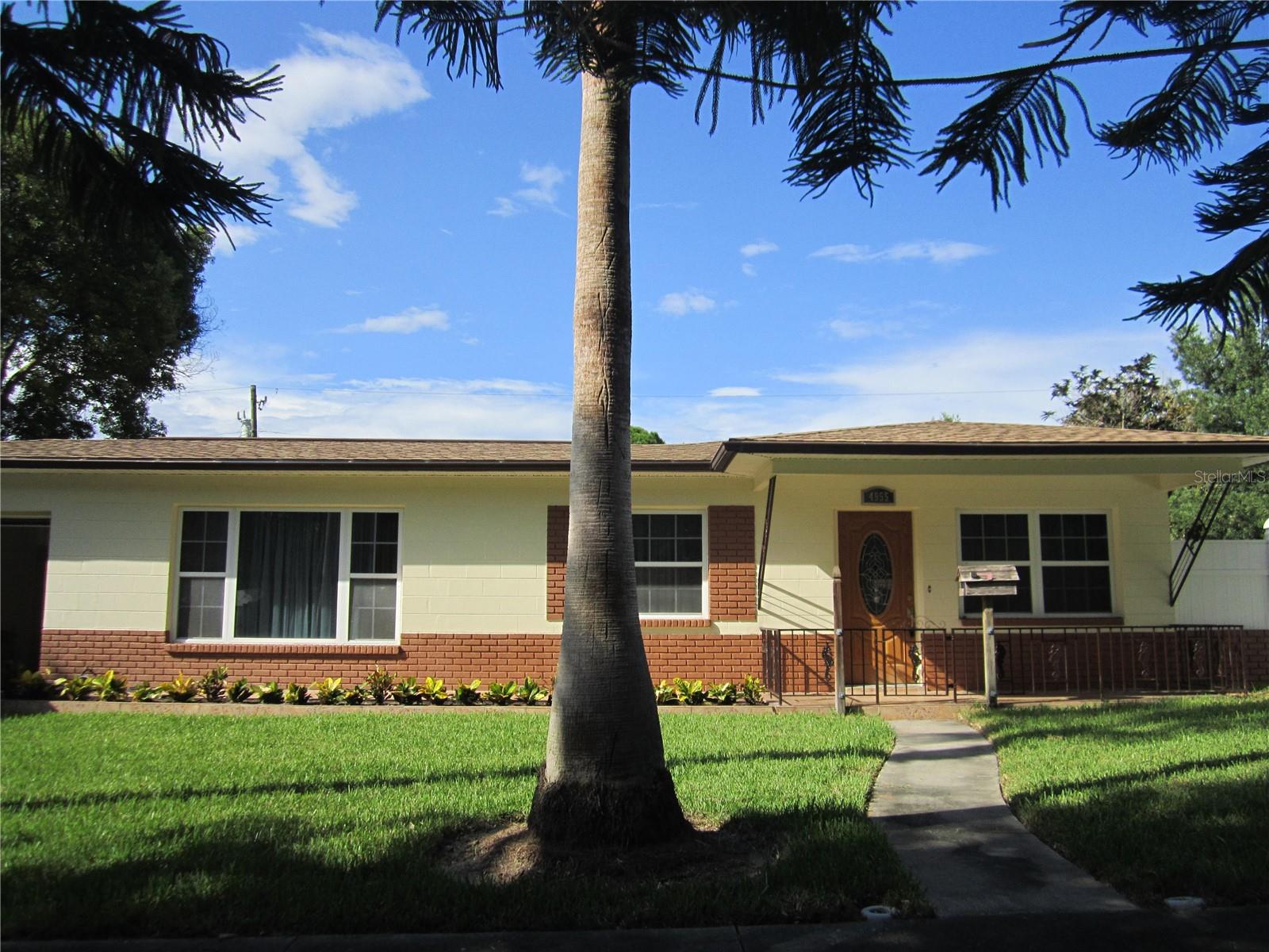 Diston Hills sub. Convenient to downtown St Petersburg or minutes to the gulf beaches. Large 2 bedroom 2 bath home with attached garage and family room. 1406 sq ft! CLEAN! well maintained home. Fenced. Large updated kitchen, nice living room, separate family room with breakfast bar for entertaining. Freshly painted and clean. NO carpet. Washer and dryer included in garage. Room for a home office. Central heat and air. Large shed suitable for a workshop. Rent includes lawn care. Small pet ok, prefer cats. $2300/mo. Wont last!