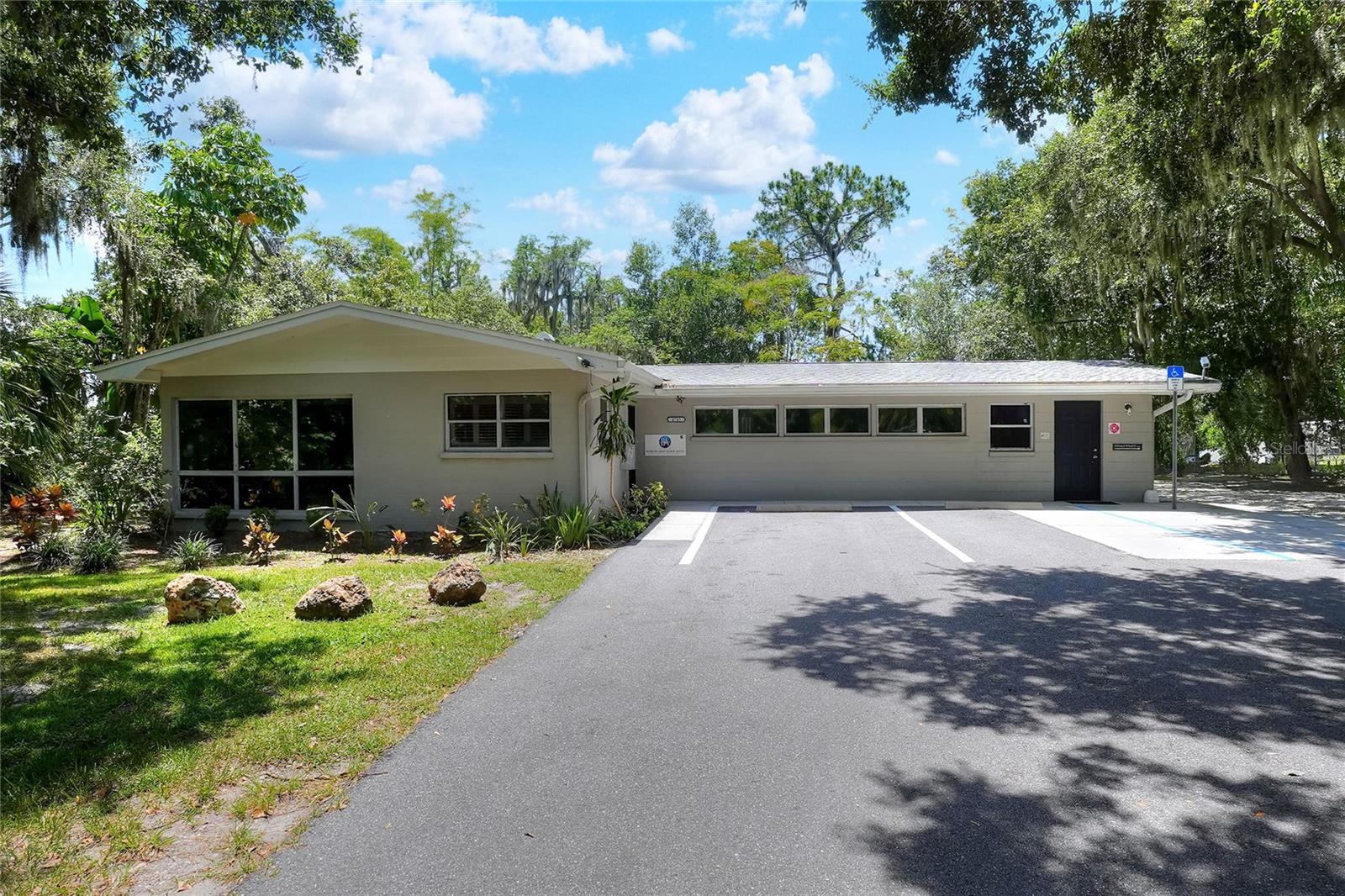 Discover the perfect space for your professional practice in this serene and well-maintained South Lakeland office building. This private office suite offers an exceptional opportunity for professionals seeking a quiet and productive work environment.The available suite is generously sized at approximately 19' x 11', providing ample room for a desk, client seating, and necessary professional equipment. A key feature of this suite is its private entrance, offering convenience and discretion for both you and your clients.In addition to the main office, the suite includes a large 10' x 4' utility and storage closet. While this closet houses the building's water heater and circuit breaker panel, it still provides significant space for files, supplies, and storage. This space is partially furnished. Shared spaces include ADA restroom, comfortable waiting area with nature viewing window, and a workroom for technology needs. Internet and utilities are provided.
Ideal Use: This office is situated within a quiet building and is perfectly suited for professionals and practices that thrive in a tranquil atmosphere. It is an ideal setting for accountants, counselors, therapists, massage therapists, chiropractors, or other consultants who require a peaceful and focused environment.
