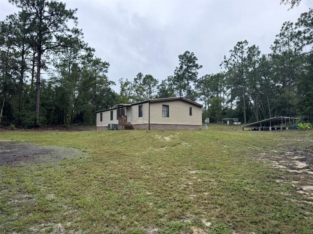 Photo of 13322 SW 95th Street, Dunnellon, FL 34432 (MLS # TB8537678)