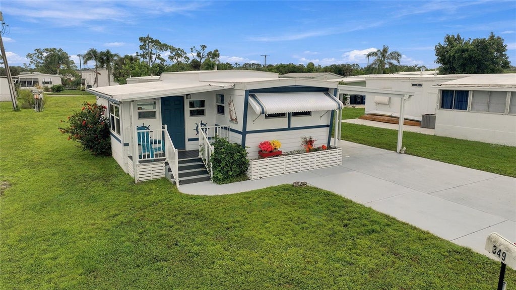 Photo of 349 Blackburn Boulevard, North Port, FL 34287 (MLS # C7531727)