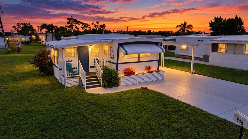 Photo of 349 Blackburn Boulevard, North Port, FL 34287 (MLS # C7531727)