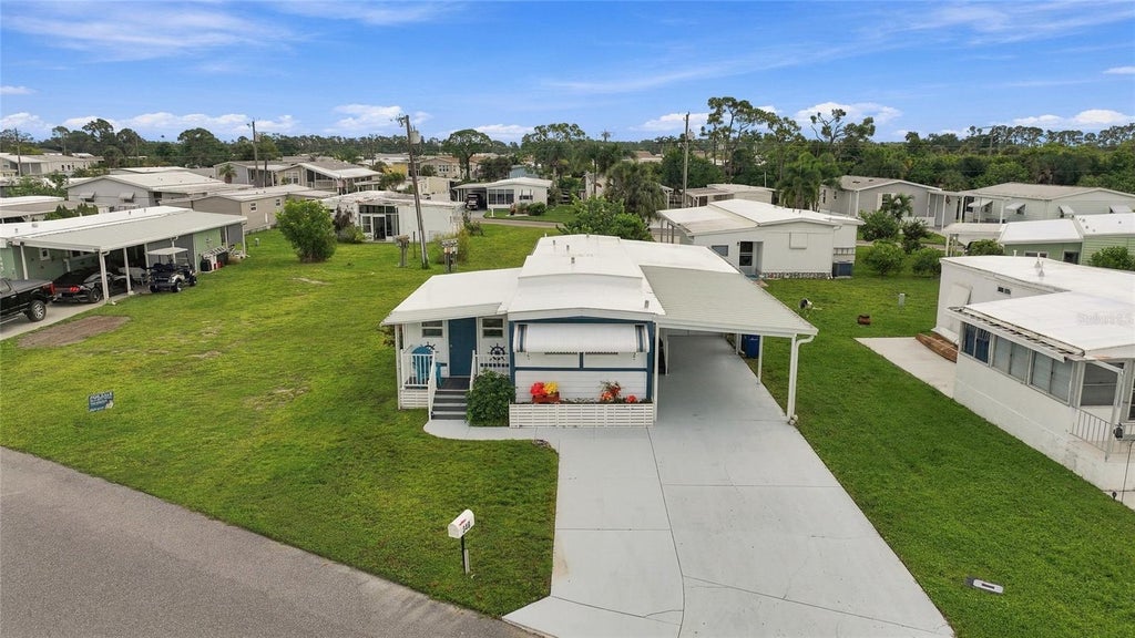 Photo of 349 Blackburn Boulevard, North Port, FL 34287 (MLS # C7531727)