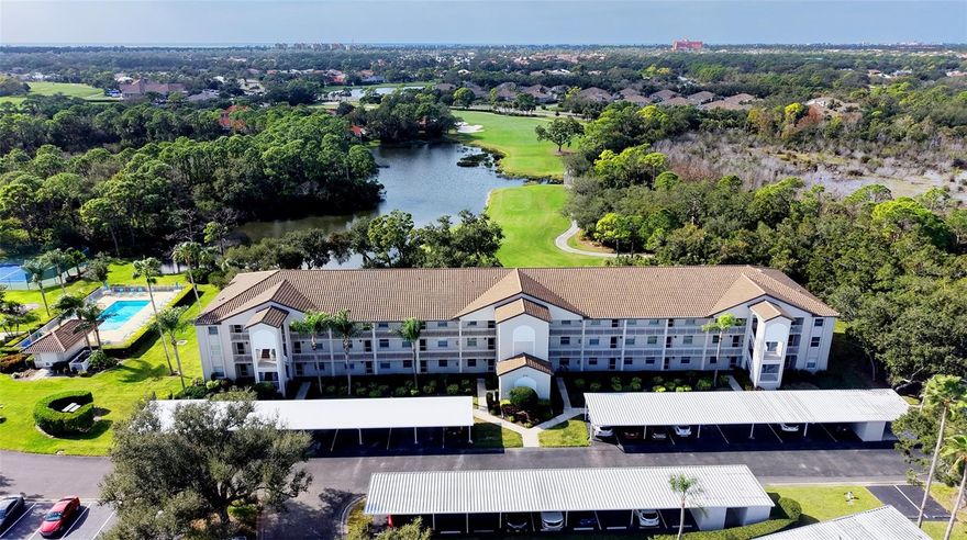 Come and get wowed by this 3rd Floor updated Terrace unit with endless views of the 9th fairway and lakes.  Enjoy the endless Florida Sunsets and the High End upgrades, Impact windows and sliders, matching plank tile flooring throughout the Home, Chef's kitchen with exotic Granite Counters, tiled Backsplash, LG Stainless Steel Appliances, Island design with the original kitchen walls removed, coffee bar.  Plantation shutters throughout!  Offered partially furnished, the Glassed-in Lanai flows right from the living area,  Primary Bedroom with walk-in closets, redesigned bath has been opened up and quarts counters.  Guest Suite has Granite counters and offer separation from the Primary.  The Terraces boasts upgraded and updated Tile Roofs, fresh paint colors and elevator has been updated recently. Each unit has its own carport spot and separate storage space.  Community pool, pickleball/tennis court, grill areas and the neighbors almost nightly gather.  Love of community and pride in ownership abound at the Terraces.  Stoneybrook of Sarasota A premier member-owned country club, is only a short distance from Siesta Key and offers easy access to shopping and borders the Legacy Trail. Ownership in Stoneybrook Golf and Country Club includes a completely updated 18 hole golf course in 2024, clubhouse and restaurant, Har-Tru tennis facility, well-equipped fitness center and additional club pool and spa.  Nestled between Downtown Sarasota and Downtown Venice.