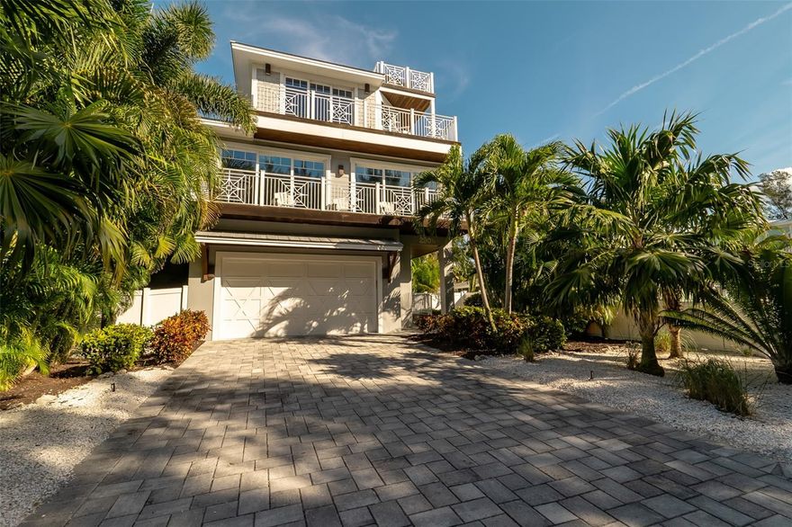 This 4 Bedroom, 3-1/2 bath home is the perfect place to vacation where you live.  Just steps from the beach on spectacular Anna Maria Island.   Coastal elegant home boasts multiple decks, including a rooftop deck overlooking the Gulf of Mexico, perfect for viewing worldclass sunsets.   Mature landscaping provides complete privacy for your incredible backyard complete with heated pool and spa. Covered lanai area with large tv makes for an enjoyable hangout space for you and your friends.  The ground floor level consists of ample storage closets and a large bonus room.  2nd level features open concept living.  Chef’s kitchen with Thermador appliances includes natural gas cooktop, double ovens, 48” refrigerator, dishwasher and wine refrigerator.   Luxurious 2nd level en-suite bedroom with oversized bathroom including marble floors, double vanity and a large shower.   3rd floor master bedroom and bath with soaking tub, double vanity, water closet, and large shower.  There are two additional bedrooms and a shared bathroom.  Additional features include oak hardwood floors, quartz countertops, marble floors in all bathrooms.  Laundry room with plenty of storage and a tankless hot water heater and elevator. Elegant coastal decorating/turnkey furnished. Lovingly maintained one owner home.  Great rental potential/zoned for weekly rentals. Room Feature: Linen Closet In Bath (Primary Bedroom). Room Feature: Linen Closet In Bath (Primary Bedroom 2).