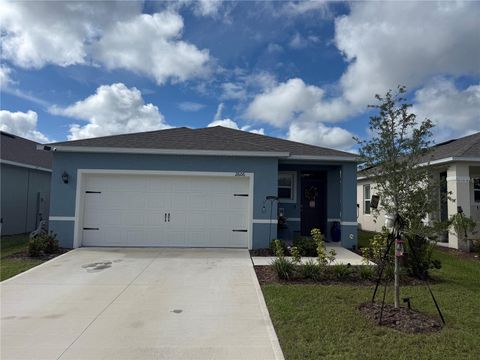 Photo of 2606 Angel Falls Drive, Davenport, FL 33837 (MLS # O6341096)