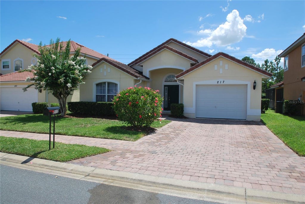 Photo of 217 Robin Road, Davenport, FL 33896 (MLS # R4911672)