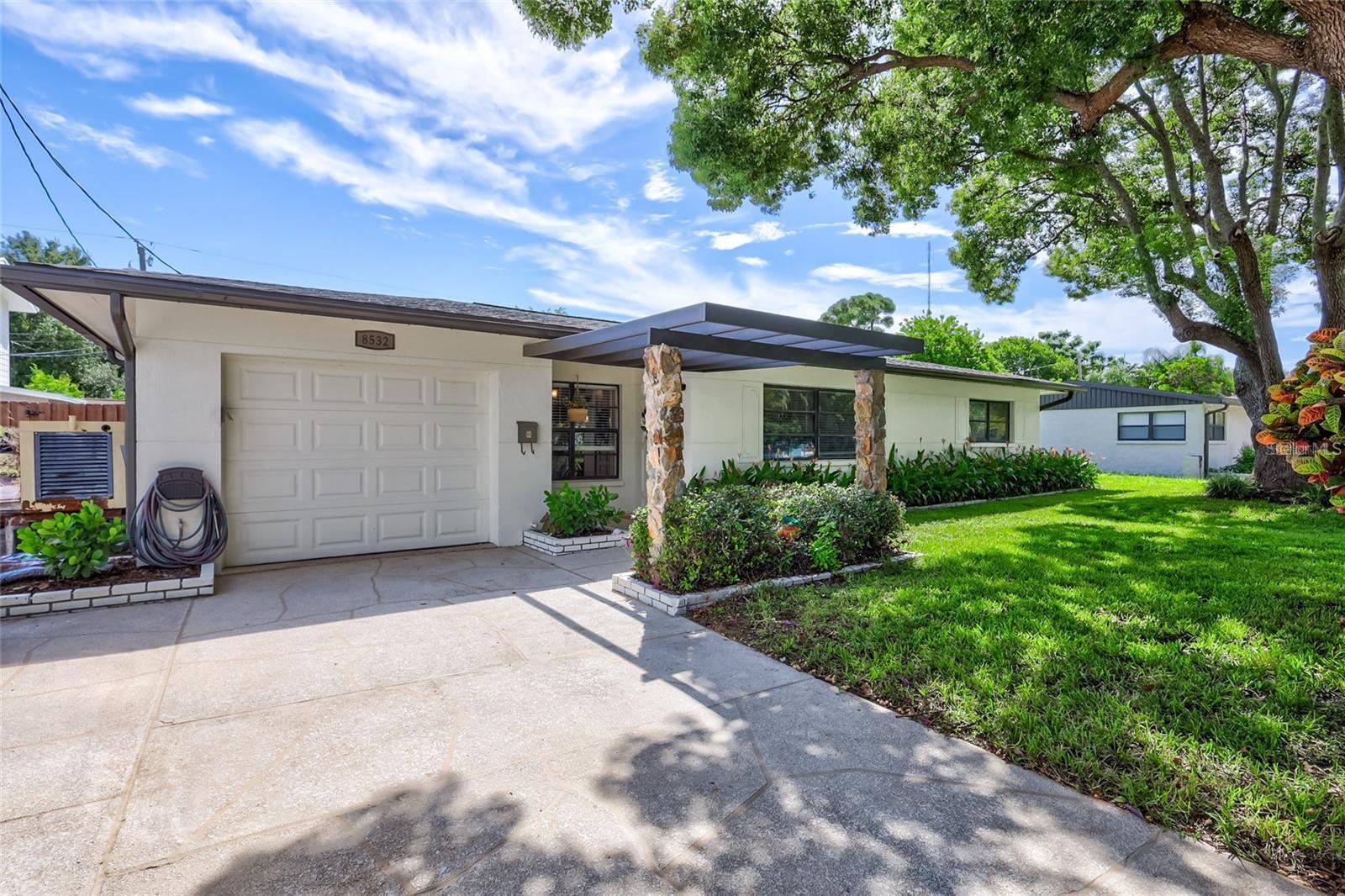 Discover this vibrant and inviting 3-bedroom, 3-bathroom single-family home at 8532 Kumquat Ave., nestled in the desirable Bardmoor neighborhood of Pinellas County, Florida—an area renowned for its friendly community, award-winning dining, stunning beaches, world-class golf courses, museums, and eclectic restaurants. This exceptional property features a CUSTOM CHEF'S KITCHEN with STAINLESS STEEL APPLIANCES and rare black GRANITE COUNTERTOPS, ideal for culinary enthusiasts, complemented by a cozy WOOD-BURNING FIREPLACE that adds warmth and charm. Designed for versatile living, it offers DUAL MASTER SUITES, making it perfect as a "step-up home," a "multi-generational family" residence, or a lucrative "SHORT TERM RENTAL INVESTMENT PROPERTY." The spacious BONUS ROOM provides extra space for relaxation or entertainment, while the refreshing POOL creates a stunning outdoor retreat. Plus, with NO HOA fees and ample space for a boat, this home is ideal for outdoor enthusiasts and water lovers alike. Located for ultimate convenience, this property offers easy access to Pinellas County’s vibrant attractions, seaside adventures, and renowned culinary scene. Don’t miss this opportunity to own a stylish, INCOME-READY home in one of Florida’s most sought-after communities. Schedule your private tour today and embrace the ultimate Pinellas County lifestyle!