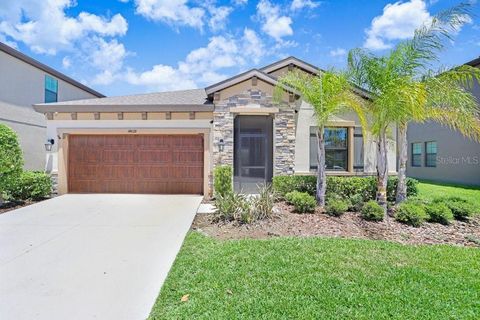Photo of 14828 Paddock Pond Avenue, Lithia, FL 33547 (MLS # TB8506646)