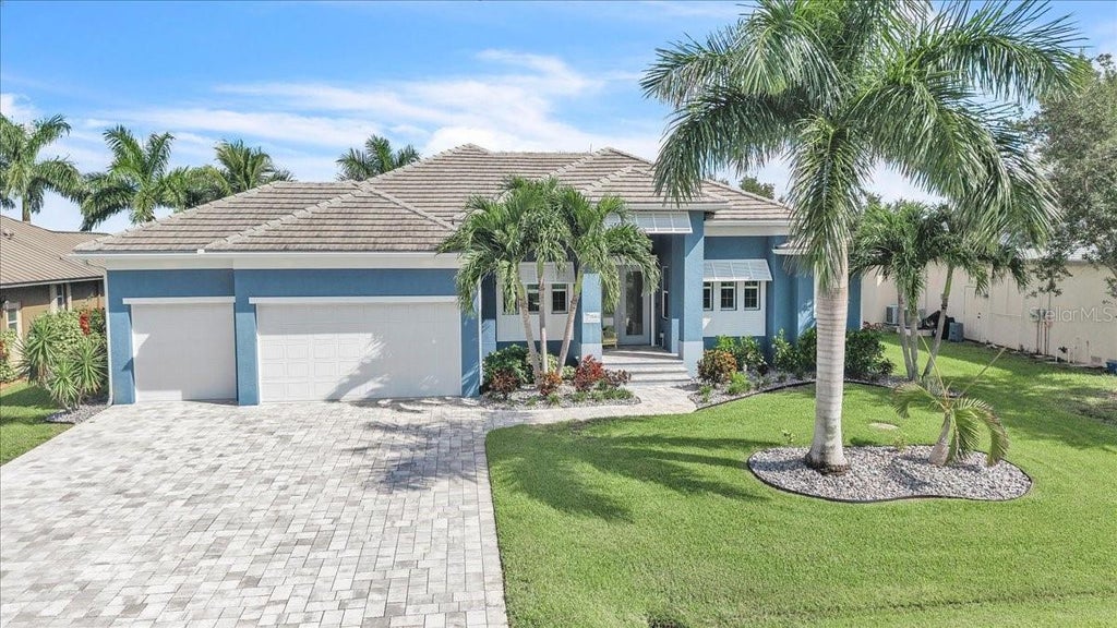 Photo of 15084 Taurus Circle, Port Charlotte, FL 33981 (MLS # C7530647)