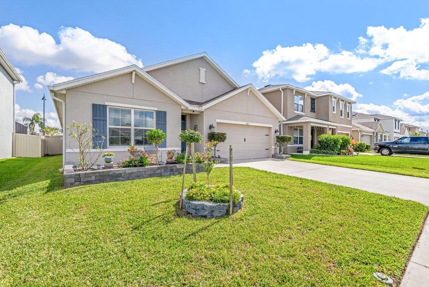 This stunning home is as good as new — if not better! Built in 2019, this beautifully improved 4-bedroom, 2-bath home is move-in ready and full of upgrades. The split floor plan offers open, light-filled living spaces and no carpet throughout. The kitchen is the heart of the home with sleek quartz countertops, a large stainless steel sink, updated appliances, a walk-in pantry, and a gorgeous backsplash. Both bathrooms have been tastefully updated, including the spacious primary suite, which features a walk-in shower, double sinks, and a large walk-in closet. Enjoy outdoor living on the screened lanai and easy-care backyard, paved for entertaining. The community offers pools, a fitness center, a clubhouse, a dog park, open spaces, and access to the scenic Suncoast Trail — a perfect place to enjoy nature, walks, and so much more. Conveniently located near shopping, dining, and area attractions. Hurry — this home is ready for you!