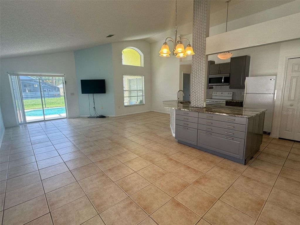 Photo of 611 Casterton Circle, Davenport, FL 33897 (MLS # S5147110)