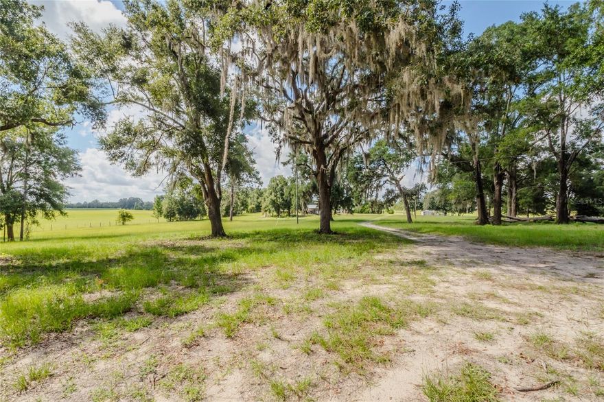 10 Acres in Southern Columbia County near Rivers and Springs for sale! Secluded but yet less than 1/2 mile from the Town limits of Fort White, the parcel has open pasture and established Oaks creating an ideal homesite. It has an existing 4" capped water well, all that is lacking is a pump, controls and tank. Also present is an existing Agriculture structure previously used as an animal shelter/feed room for cattle operations. Site Built and manufactured homes are allowed.