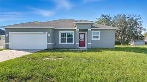 Photo of 1927 Drum Drive, Poinciana, FL 34759 (MLS # TB8417446)