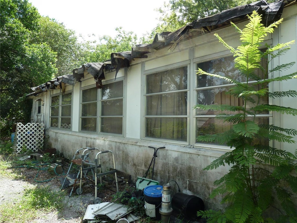Photo of 1202 Lucas Street, Holiday, FL 34691 (MLS # TB8549866)