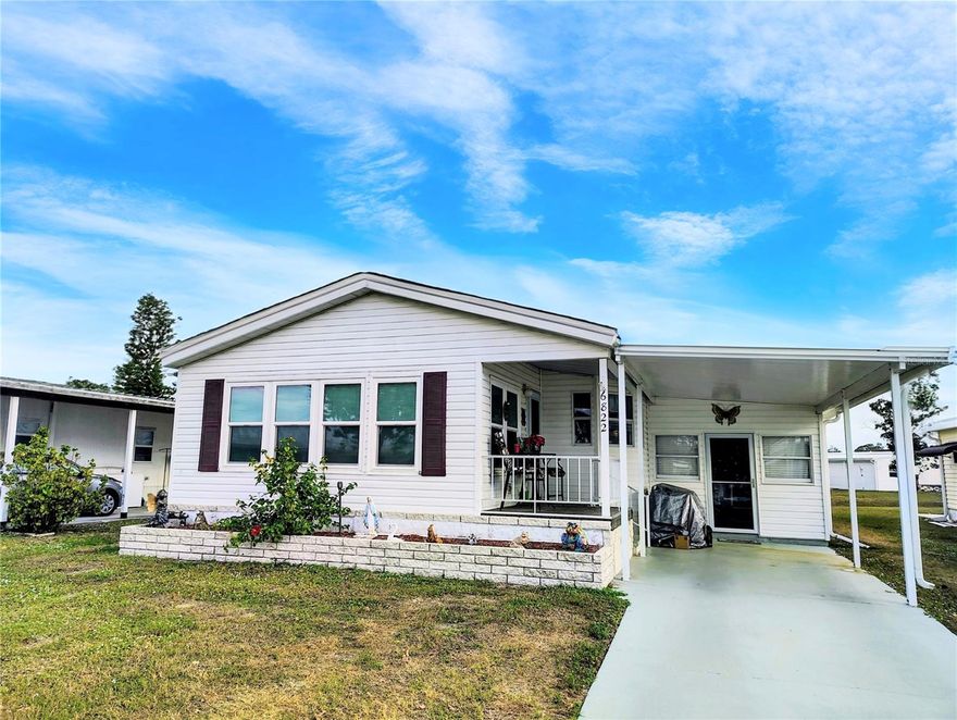 Welcome to Holiday Park, one of North Port’s most sought-after communities! This well-maintained home at 6822 Hikina Drive sits on OWNED LAND with LOW FEES, offering exceptional value and peace of mind. Pet Friendly!
The home features a new front porch, perfect for enjoying Florida mornings, along with a newer roof 2023 and AC replaced in 2016. Inside, you’ll find a comfortable OPEN layout that includes a BONUS BEDROOM/MAN CAVE, ideal for guests, a hobby room, home office, or extra living space. Pride of ownership shows throughout, making this home truly move-in ready. This home offers a storage room/workshop. When you walk into the Florida family room you will feel like you are at home. Walk into this open floor plan with high ceilings where you can relax in the dining room or living room area that is open to the kitchen. Great for entertaining! Right to the side of the kitchen and living area you step down into a man cave or make it an extra bedroom. Don't let the square footage worry you. This home has a LOT OF LIVING SPACE!  
Located on a quiet street, Holiday Park is known for its welcoming atmosphere and outstanding amenities, including a clubhouse, pool, recreational facilities, and an active social calendar. Conveniently close to shopping, dining, medical facilities, and the beautiful Gulf Coast beaches.