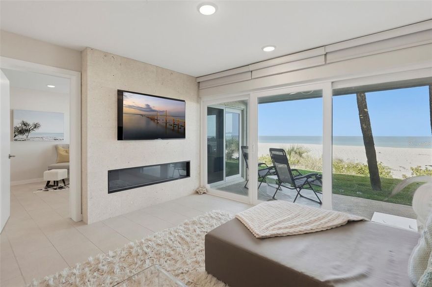 A rare and remarkable offering along the Gulf Coast — this exceptional ground-floor Gulf-front residence in Belleair Beach delivers the lifestyle of a multi-million-dollar beachfront estate at a fraction of the cost.
What truly sets this property apart — and makes it a true unicorn — is its unparalleled combination of direct, walk-out Gulf access and elevated construction in Flood Zone X500, meaning no flood insurance is required. Even during the 2024 storms, the unit remained completely unaffected. This level of security paired with immediate beach access is extraordinarily rare along the Pinellas coastline and typically reserved for luxury single-family homes.
Step outside your private lanai and onto an expansive lawn that seamlessly transitions to the powdery white sands and turquoise waters of the Gulf — offering effortless indoor-outdoor living that is nearly impossible to find in condominium living.
Inside, the residence is thoughtfully designed with both comfort and sophistication in mind. The spacious kitchen features stainless steel appliances, abundant storage, and beautiful honed granite countertops, flowing effortlessly into the open living and dining areas. The living room is anchored by a striking electric fireplace with a custom shell-tile surround and opens to sweeping Gulf views. A built-in teppanyaki grill adds a unique and elevated touch for entertaining.
The primary suite is a serene retreat with stunning water views and custom built-in closets, while the spa-like ensuite bath offers dual vanities and a walk-in travertine shower. The split floor plan provides privacy, with guest quarters separated by a frosted glass partition, offering built-in storage and a well-appointed guest bath. A dedicated laundry area with custom cabinetry and folding station adds everyday convenience.
Additional highlights include impact-rated windows throughout, hurricane shutters on Gulf-facing openings, textured tile flooring, curated coastal design elements including a custom conch shell art feature, and an assigned parking space.
The community is impeccably maintained, with milestone inspection and SIRS completed, and offers a Gulf-front heated pool, grilling area, and an abundance of guest parking — ideal for hosting family and friends.
Located in the highly private and residential enclave of Belleair Beach — known for its exclusivity and low density — this property is also one of the few along the Pinellas coastline that allows two large dogs, an increasingly rare and highly sought-after feature.
Just minutes from the Shoppes of Sand Key, Clearwater Beach, St. Petersburg, and Tampa International Airport, this is a unique opportunity to own a Gulf-front property that truly lives like a private beachfront home — without the multi-million-dollar price tag.
Luxury. Rarity. Resilience. Location.
This is coastal living redefined.
