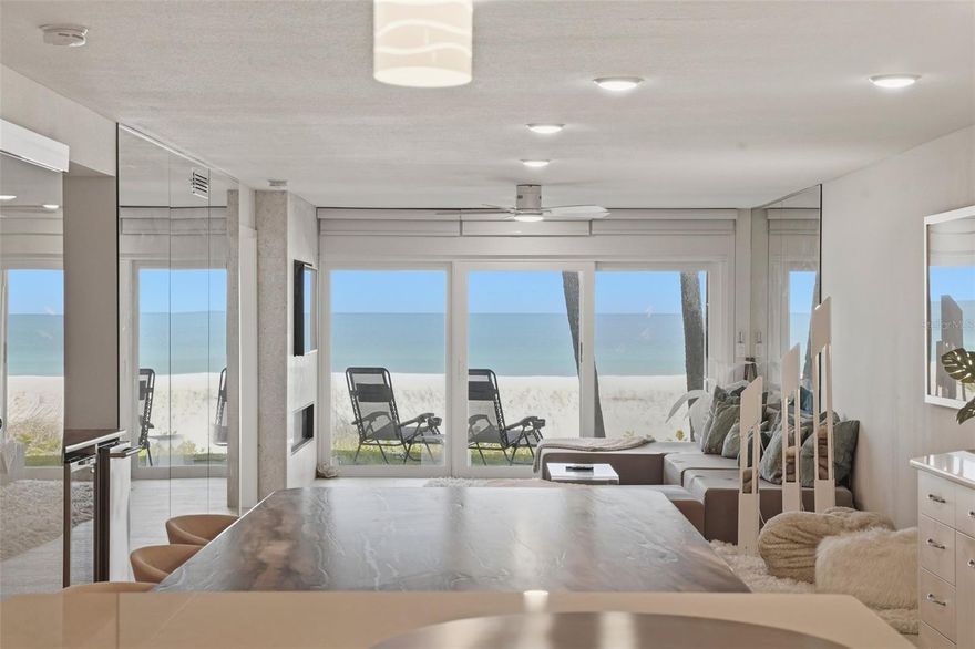 A rare and remarkable offering along the Gulf Coast — this exceptional ground-floor Gulf-front residence in Belleair Beach delivers the lifestyle of a multi-million-dollar beachfront estate at a fraction of the cost.
What truly sets this property apart — and makes it a true unicorn — is its unparalleled combination of direct, walk-out Gulf access and elevated construction in Flood Zone X500, meaning no flood insurance is required. Even during the 2024 storms, the unit remained completely unaffected. This level of security paired with immediate beach access is extraordinarily rare along the Pinellas coastline and typically reserved for luxury single-family homes.
Step outside your private lanai and onto an expansive lawn that seamlessly transitions to the powdery white sands and turquoise waters of the Gulf — offering effortless indoor-outdoor living that is nearly impossible to find in condominium living.
Inside, the residence is thoughtfully designed with both comfort and sophistication in mind. The spacious kitchen features stainless steel appliances, abundant storage, and beautiful honed granite countertops, flowing effortlessly into the open living and dining areas. The living room is anchored by a striking electric fireplace with a custom shell-tile surround and opens to sweeping Gulf views. A built-in teppanyaki grill adds a unique and elevated touch for entertaining.
The primary suite is a serene retreat with stunning water views and custom built-in closets, while the spa-like ensuite bath offers dual vanities and a walk-in travertine shower. The split floor plan provides privacy, with guest quarters separated by a frosted glass partition, offering built-in storage and a well-appointed guest bath. A dedicated laundry area with custom cabinetry and folding station adds everyday convenience.
Additional highlights include impact-rated windows throughout, hurricane shutters on Gulf-facing openings, textured tile flooring, curated coastal design elements including a custom conch shell art feature, and an assigned parking space.
The community is impeccably maintained, with milestone inspection and SIRS completed, and offers a Gulf-front heated pool, grilling area, and an abundance of guest parking — ideal for hosting family and friends.
Located in the highly private and residential enclave of Belleair Beach — known for its exclusivity and low density — this property is also one of the few along the Pinellas coastline that allows two large dogs, an increasingly rare and highly sought-after feature.
Just minutes from the Shoppes of Sand Key, Clearwater Beach, St. Petersburg, and Tampa International Airport, this is a unique opportunity to own a Gulf-front property that truly lives like a private beachfront home — without the multi-million-dollar price tag.
Luxury. Rarity. Resilience. Location.
This is coastal living redefined.