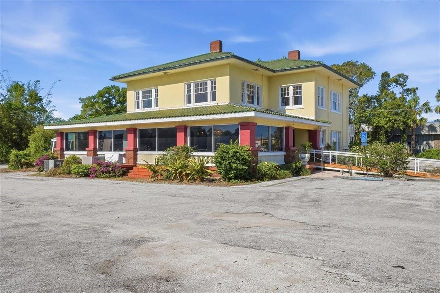 The J C COURTNEY HOUSE. A rare opportunity to acquire a prominent, historic property positioned along one of the most traveled corridors in North Manatee County. Built in 1923, this iconic structure blends timeless character with functional scale, offering over 6,000 square feet across two levels on a 0.76-acre site with exceptional visibility and access. The main level features multiple dining & special event rooms, ideal for restaurant, hospitality, retail, or adaptive reuse. Existing infrastructure includes a 10x10 walk-in freezer and 10x10 walk-in refrigerator, supporting food and beverage operations, along with a designated dumpster pad for service efficiency. The property is also equipped with ADA ramp access and abundant on-site parking for 50+ vehicles, a significant advantage for this corridor. The second floor (approx. 1,930 SF) offers flexibility with six rooms (bedrooms or offices) and three fireplaces, well-suited for executive offices, boutique workspace, or potential conversion to suites. Located directly on Business 41 (8th Ave W), the property benefits from high daily traffic counts of 30,000 to 40,000+ vehicles (seasonal), providing strong exposure for owner-users or investors seeking a high-visibility asset. Surrounding development is accelerating. A 152-unit riverfront mixed-use project is underway adjacent to the site, along with an additional 80-unit mixed-use development featuring 15,000 square feet of retail just one block away, bringing increased density and long-term value to the immediate area. Palmetto continues to evolve as a historic waterfront destination along the Manatee River, ideally positioned between St. Petersburg and Sarasota. Demand is rising for authentic, locally driven concepts that embrace the area's coastal heritage and walkable downtown character. The nearby Palmetto Marriott Resort & Spa and Bradenton Area Convention Center have recently completed construction and are now attracting larger regional events, further supporting commercial growth and business opportunity in the corridor.