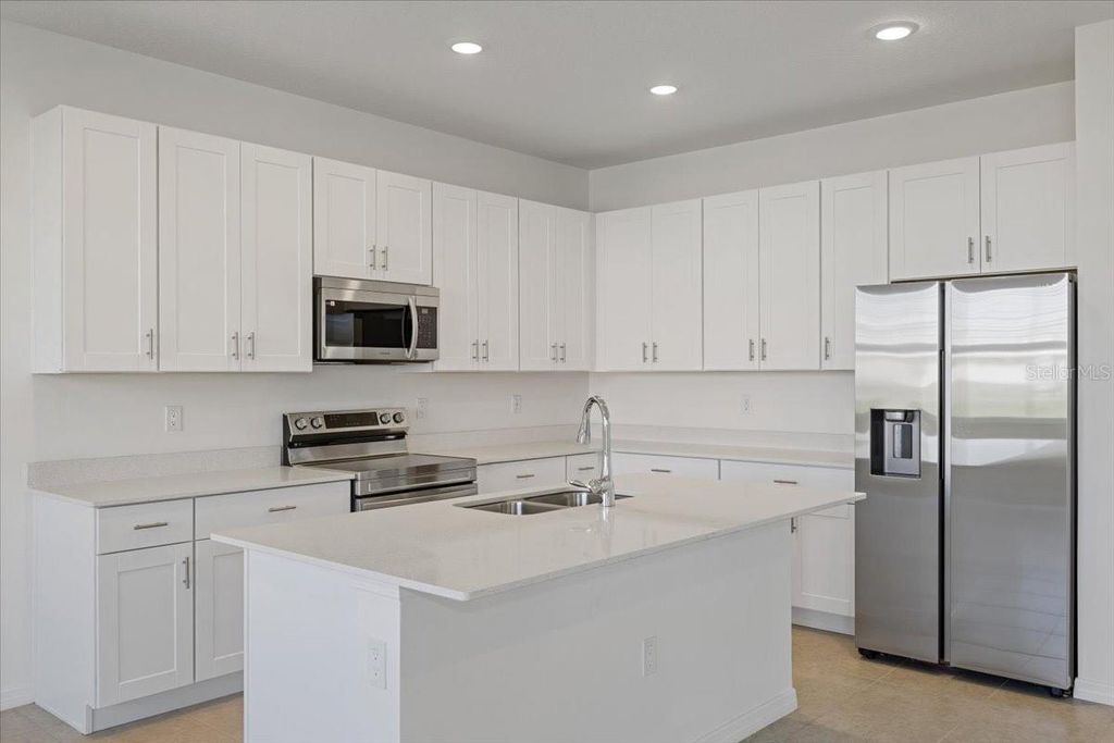 Photo of 163 Bottle Brush Dr, Haines City, FL 33844 (MLS # O6356087)