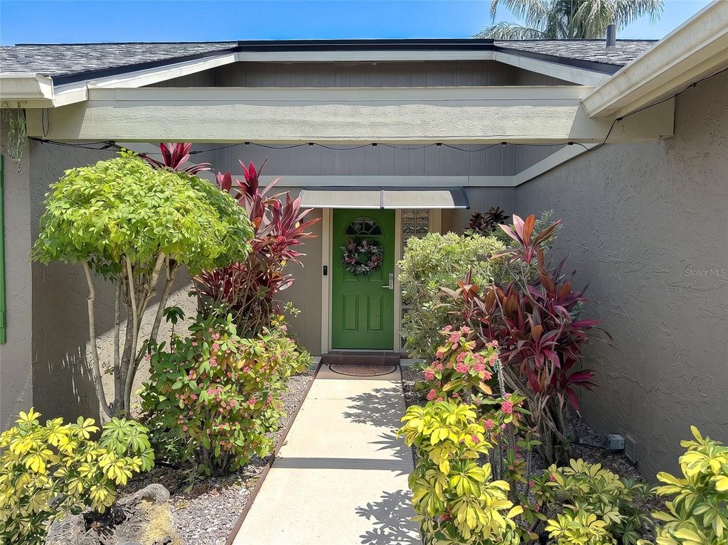 Photo of 1613 St Catherine Drive E, Dunedin, FL 34698 (MLS # TB8517807)