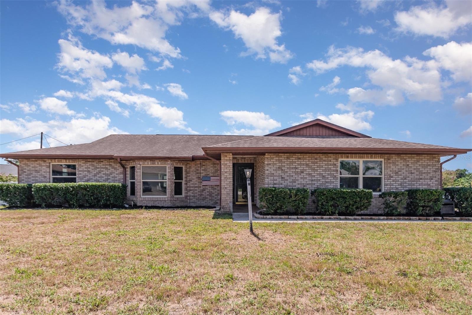 Brick 3BR/2BA Beauty on a Spacious Corner Lot! This well-maintained home offers a functional split-bedroom floor plan, newer dual-pane windows, and a climate-controlled bonus room for year-round comfort. The layout provides multiple living spaces with a family room and living room on either side of the kitchen, plus a formal dining room and breakfast nook—perfect for both everyday living and entertaining. The spacious primary suite features an ensuite bath, large walk-in closet, and private access to the sunroom. Sliding glass doors open from the family room into the bright bonus room with mini-split A/C and heat, ideal for a home office, gym, studio, or guest space. Enjoy the outdoors on the oversized back deck, in the fenced backyard, or with the added storage of a shed. Ornamental stained glass adds unique charm. Situated on a desirable corner lot, this property is just minutes from I-4, shopping, and less than 40 minutes from the Atlantic Ocean, with lakes and the St. Johns River nearby for endless outdoor recreation. With its amenities, versatility, and location, this home is one of the best values in Volusia! Multiple Offers- Submit Final & Best by 6pm Wednesday (08/20/2025)