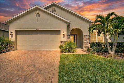 Photo of 4346 Cypress Glades Lane, Orlando, FL 32824 (MLS # O6398457)