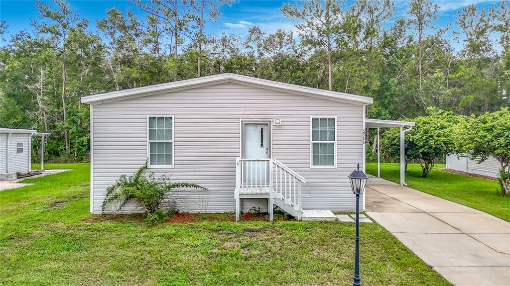 Photo of 2908 Kingswood Circle, Brooksville, FL 34604 (MLS # TB8553484)