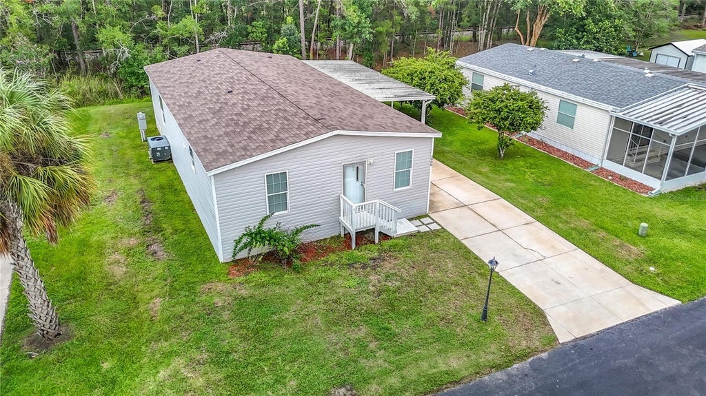 Photo of 2908 Kingswood Circle, Brooksville, FL 34604 (MLS # TB8553484)