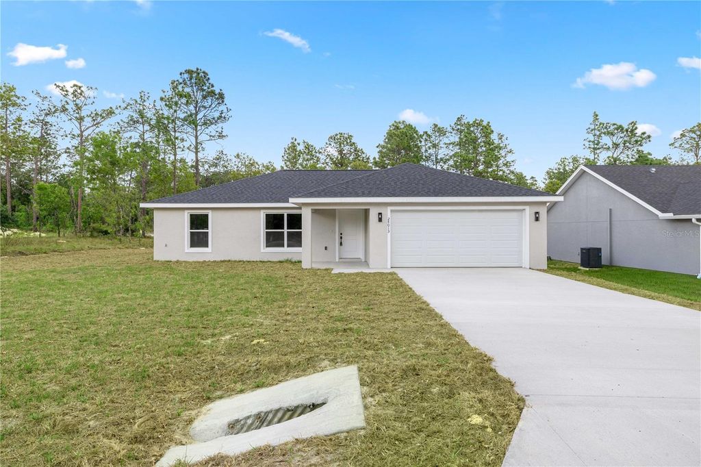 Photo of 24013 NW Tamarind Lane, Dunnellon, FL 34431 (MLS # OM724131)