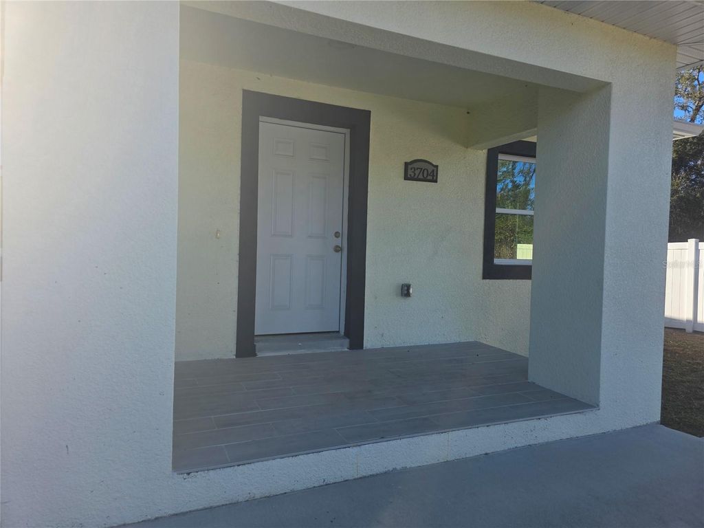 Photo of 3704 Smith Tree Street, Tampa, FL 33619 (MLS # TB8384958)