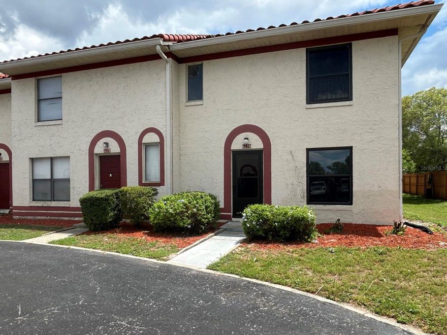 Beautiful two-story condo in gated community, featuring 2-bedrooms and 2.5-baths, with both bedrooms conveniently located upstairs, each having it’s own private bath and a half bath on the main floor for guests. The unit offers an inside laundry hook-up, tile flooring throughout the downstairs living areas, and new waterproof vinyl flooring upstairs. The updated kitchen features newer cabinetry, granite countertops, and stainless-steel appliances. Fresh interior paint gives the home a clean, move-in-ready feel.Enjoy outdoor living in the private fenced patio area with a storage closet. The property also features a newer tile roof for added value and peace of mind.Residents enjoy an amenity rich community with clubhouse, 2 pools, hot tub, tennis courts, and a dog walking path. The low HOA fee includes lawn care, exterior pest control, roof, ground maintenance, and building exterior upkeep. Living in the heart of Orlando, you are just minutes from Downtown, Orlando International Airport (MCO), Major highways - I-4, SR408, SR528, Orlando’s famous attractions, University of Central Florida (UCF), Valencia Community College, Shopping, and there is a wide variety of Restaurants available. Perfect for first-time buyers, investors, or downsize. It is Move-In ready! Just waiting for a new owner.