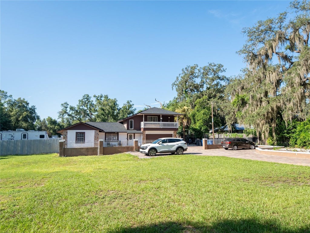 Photo of 9613 Six Mile Creek Road, Tampa, FL 33610 (MLS # TB8543025)