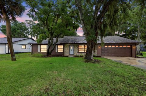 Photo of 483 Spruceview Drive, Port Orange, FL 32127 (MLS # V4949767)