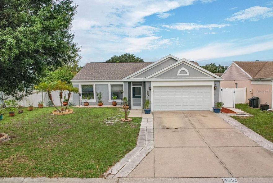 Welcome to your dream home in the conveniently located community of Braden Crossings.  This exceptional three-bedroom, two-bathroom residence offers a perfect blend of comfort and function.  The heart of this home is the inviting open floor plan, which seamlessly connects the living, dining, and kitchen spaces. It is a wonderful layout for both everyday living and entertainment. The Butler's pantry/utility room serves as an extension of the kitchen, providing efficient storage space and enhances the functionality of the home. As you step outside discover your own private oasis. A large saltwater pool and spa provide a serene retreat, whether you are cooling off on a sunny day or relaxing under the stars, and the generous outdoor entertaining space is perfect for gatherings with family and friends. The backyard is fully fenced, ensuring privacy and security, making it an ideal place for pets to play. Enjoy peace of mind with numerous recent upgrades, including a new roof, HVAC, tankless water heater, and appliances, all less than five years old. This well-established community boasts a strong Homeowners Association (HOA) and offers a vibrant and friendly atmosphere. One of the standout features of this property is its location. You are within minutes of I-75, providing easy access to nearby destinations North and South, along with shopping & dining at University Town Center, recreational areas, medical facilities, and so much more. Plus, you will be near highly sought-after schools, making it an ideal choice for families. If you have been searching for a home that combines comfort, privacy, and a great location, your search ends here. Do not miss the opportunity to make this your own. Schedule a showing today and experience the magic of this beautiful home for yourself.