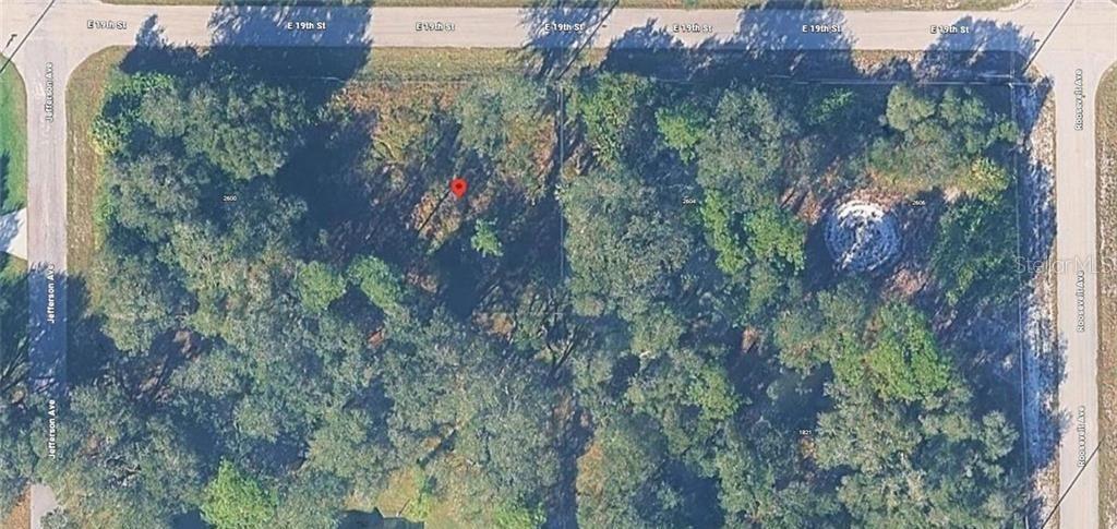 Photo of 2602 E 19th Street, Lehigh Acres, FL 33972 (MLS # O6449590)