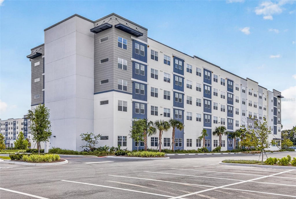 Photo of 5563 Millenia Park Blvd #417, Orlando, FL 32839 (MLS # O6445645)