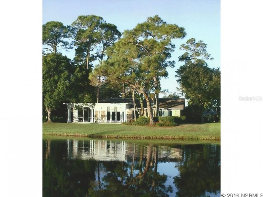 Lakefront home overlooking the golf course and multiple greens! Watch fantastic sunrises from the veranda and screened porch off the great room. Home built in 1980. Completely refurbished in 2002. Open design for gracious entertaining. A galley-like entry opens to waterfront views, a white brick fireplace for the cozy moments, tile floors throughout with Hickory floors in two bedrooms. Master suite has two closets and beautiful Hickory cabinets plus Hickory cabinets in eat-in kitchen, deluxe gas range and two gas hot water heaters. Secluded screened porch (16x14). Adjoining great room and large open porch. Third bedroom and library could be guest quarters with third bathroom. ;Water: City