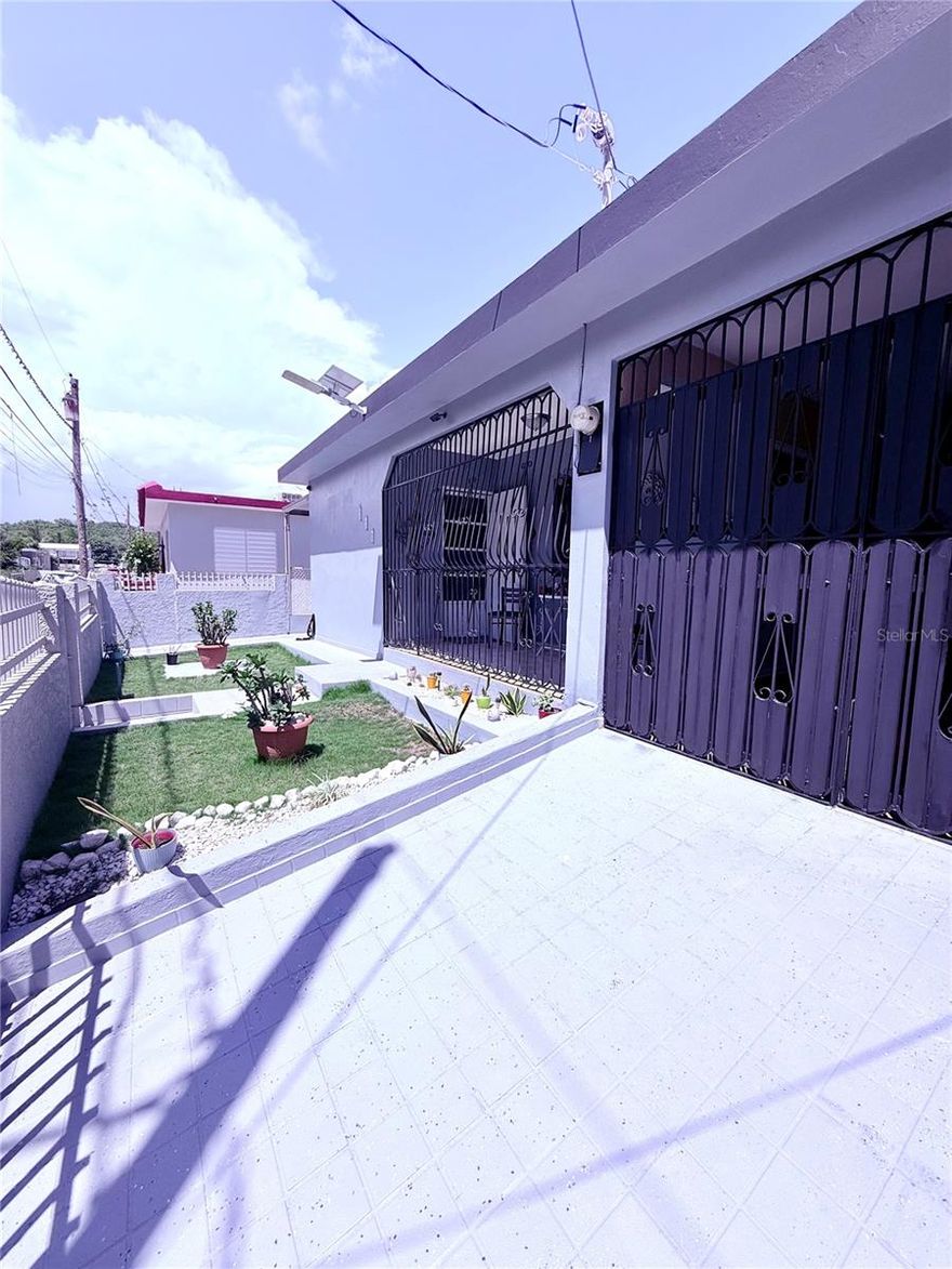 One or more photo(s) has been virtually staged. For Sale: Solar-Powered 4-Bedroom Home in Ponce, Puerto Rico – Perfect for Airbnb, Vacation, or Investment

Discover this move-in-ready 4-bedroom, 1.5-bath single-family home for sale in beautiful Ponce, Puerto Rico, just minutes from Mercedita International Airport, Caribbean beaches, historic downtown Ponce, world-class restaurants, museums, and shopping centers.

This property offers incredible flexibility—ideal as a primary residence, vacation home, Airbnb rental, or long-term real estate investment. Whether you're relocating to Puerto Rico or seeking a passive income opportunity, this home checks every box.

Enjoy a comfortable floor plan featuring:

* 4 spacious bedrooms
* 1 full bathroom and 1 half bath
* Bright living and dining areas
* Modern energy-efficient upgrades including 10 solar panels (leased and fully transferable if buyer wishes to continue enjoying solar energy) and Tesla Powerwall batteries—a top-tier system that reduces electric bills and ensures reliable power backup

Step outside to a private courtyard, perfect for family gatherings, barbecues, and relaxing under the Puerto Rican sun. The property also includes:

* A garage
* A separate carport that fits up to three vehicles, a golf cart, motorcycles, or recreational toys

Located in a peaceful residential area, this home is just a short drive from:

* La Guancha Boardwalk
* Plaza Las Delicias
* Ponce Art Museum
* Ponce Beach
* Hotels, universities, medical centers, and nightlife

With its strategic location and energy-efficient systems, this property is perfect for those seeking a turnkey Airbnb in Puerto Rico, a vacation rental near the beach, or a long-term rental investment with high income potential.

Key Features:

* Solar-powered with Tesla batteries (solar panels are leased and transferable to new owner)
* Flexible use: vacation home, Airbnb, or rental income
* Garage and 3-car carport
* Courtyard for outdoor living
* Minutes from beaches, airport, restaurants, and historic sites

Live the Caribbean lifestyle while making a smart investment. This home won’t last long in Puerto Rico’s competitive real estate market.

Contact us today to schedule your private showing.