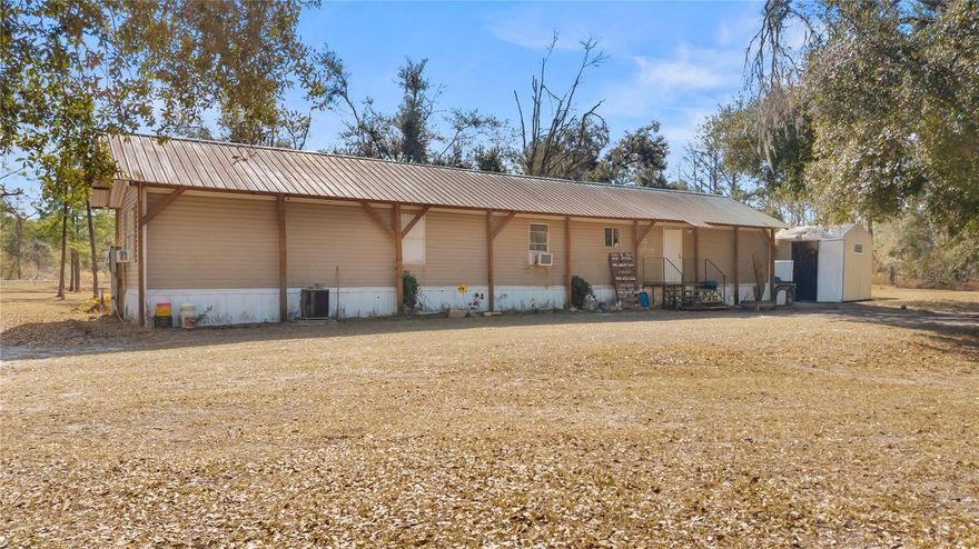 One or more photo(s) has been virtually staged. Country living at its finest.  This manufactured home sits on 5 acres.  Would like to sell with the adjacent 5-acre lot that also has a three bedroom/2bath manufactured home.