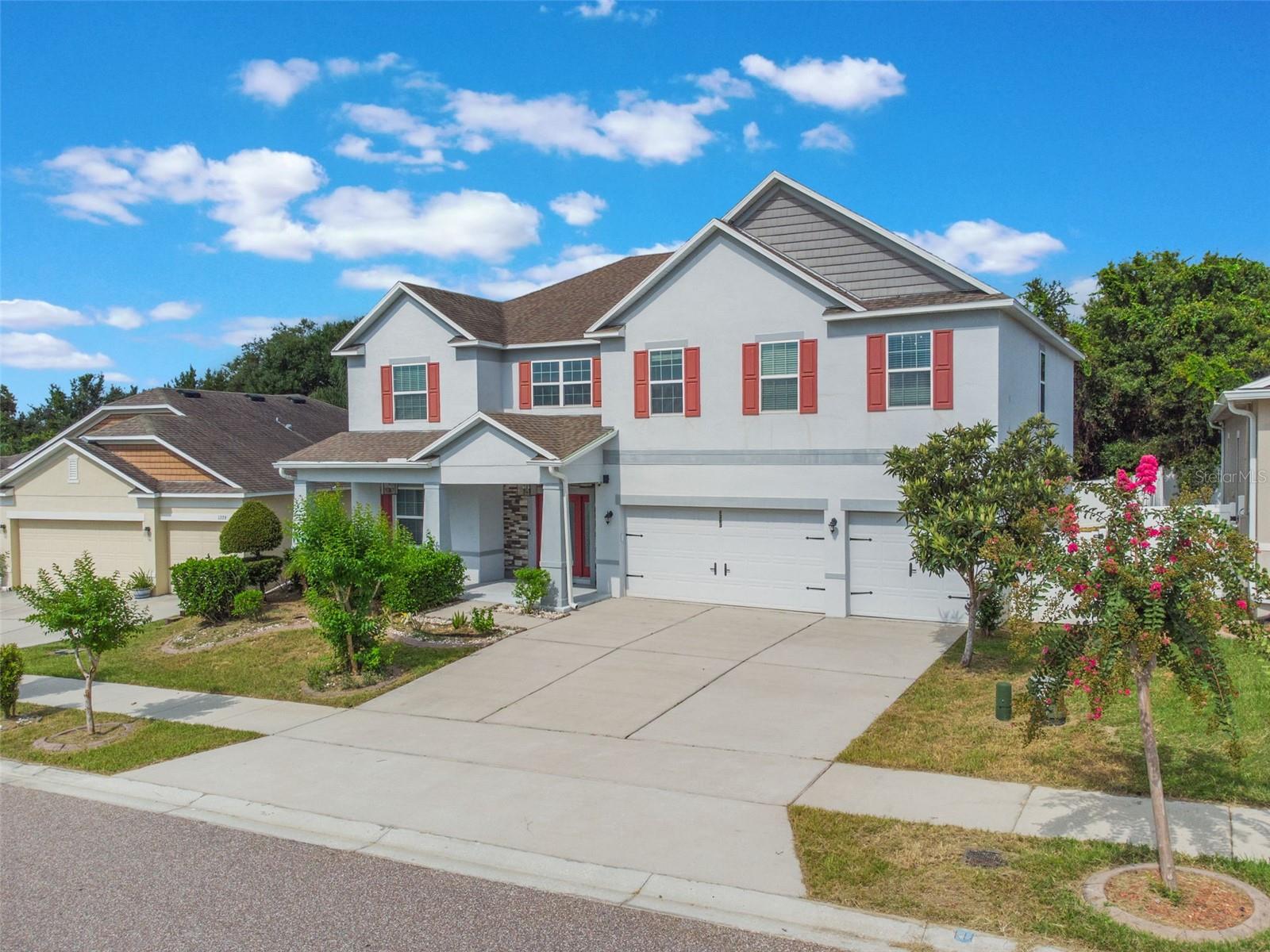 Welcome to this large 2-story home that boasts an impressive 6 bedrooms and 4.5 bathrooms with fresh interior paint. This property is a rare find with not one, but two master suites, one on each level, providing ample space and privacy for all members of the family. As you step inside, you'll be greeted by a spacious living room that seamlessly flows into the dining room - perfect for entertaining or simply relaxing after a long day. The house features no carpeting throughout; the entire first floor has tile and the second floor has luxury vinyl planks making it easy to clean and maintain. The kitchen is truly a chef's dream with plenty of counter space and storage, walk-in pantry plus additional wall pantry and double oven. Kitchen opens up to the family room area which overlooks the fenced-in yard - an ideal spot for hosting summer barbecues. On this first floor, there's also a convenient half bath for guests. Upstairs awaits an oversized Master Bedroom with an en-suite bath plus four more bedrooms and two additional full baths. A laundry room on this level adds convenience to daily chores. If you need more space? There's an expansive loft that can serve as an additional living area, game room or office space - the possibilities are endless! The property also includes a generous 3-car garage providing plenty of space for vehicles or additional storage. Nestled between downtown Clermont and Groveland off Hwy 50, this community is conveniently located close to US-27 and Turnpike. You'll also be near hospitals, shopping, restaurants, boating, fishing and so much more. Don't miss out on this incredible opportunity!