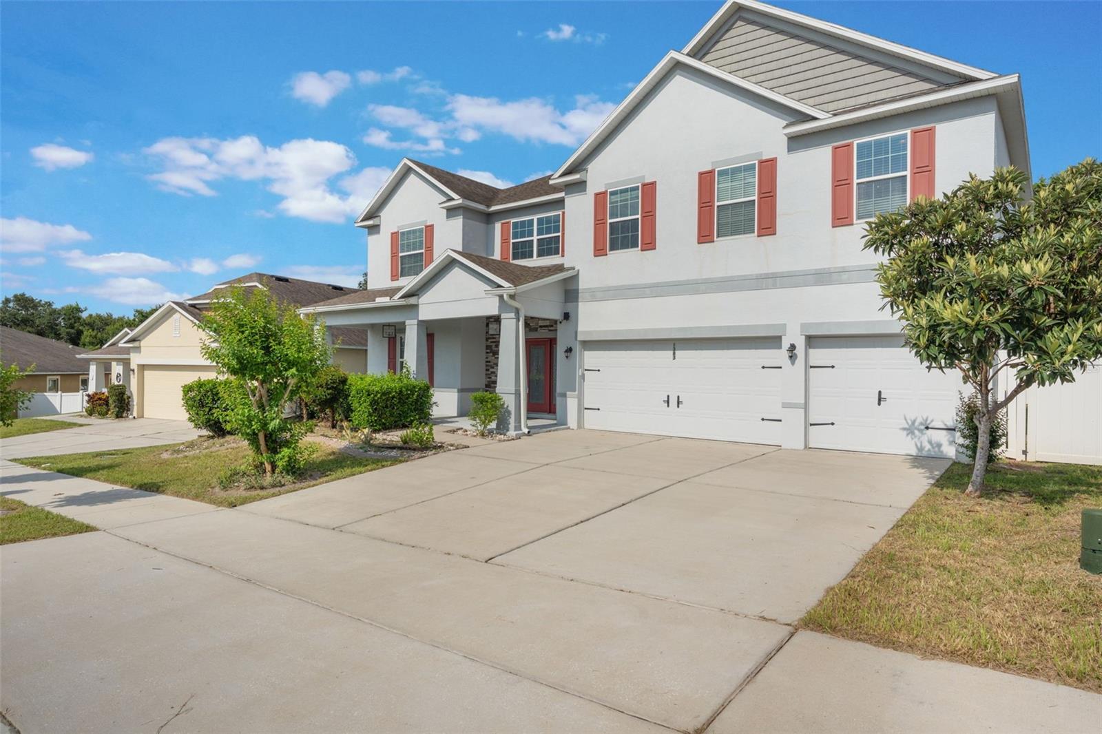 Price reduced! Welcome to this large 2-story home that boasts an impressive 6 bedrooms and 4.5 bathrooms with fresh interior paint. This property is a rare find with not one, but two master suites, one on each level, providing ample space and privacy for all members of the family. As you step inside, you'll be greeted by a spacious living room that seamlessly flows into the dining room - perfect for entertaining or simply relaxing after a long day. The house features no carpeting throughout; the entire first floor has tile and the second floor has laminate making it easy to clean and maintain. The kitchen is truly a chef's dream with plenty of counter space and storage, walk-in pantry plus additional wall pantry and double oven. Kitchen opens up to the family room area which overlooks the fenced-in yard - an ideal spot for hosting summer barbecues. On this first floor, there's also a convenient half bath for guests. Upstairs awaits an oversized Master Bedroom with an en-suite bath plus four more bedrooms and two additional full baths. A laundry room on this level adds convenience to daily chores. If you need more space? There's an expansive loft that can serve as an additional living area, game room or office space - the possibilities are endless! The property also includes a generous 3-car garage providing plenty of space for vehicles or additional storage. New sod was put in backyard. Nestled between downtown Clermont and Groveland off Hwy 50, this community is conveniently located close to US-27 and Turnpike. You'll also be near hospitals, shopping, restaurants, boating, fishing and so much more. Don't miss out on this incredible opportunity!