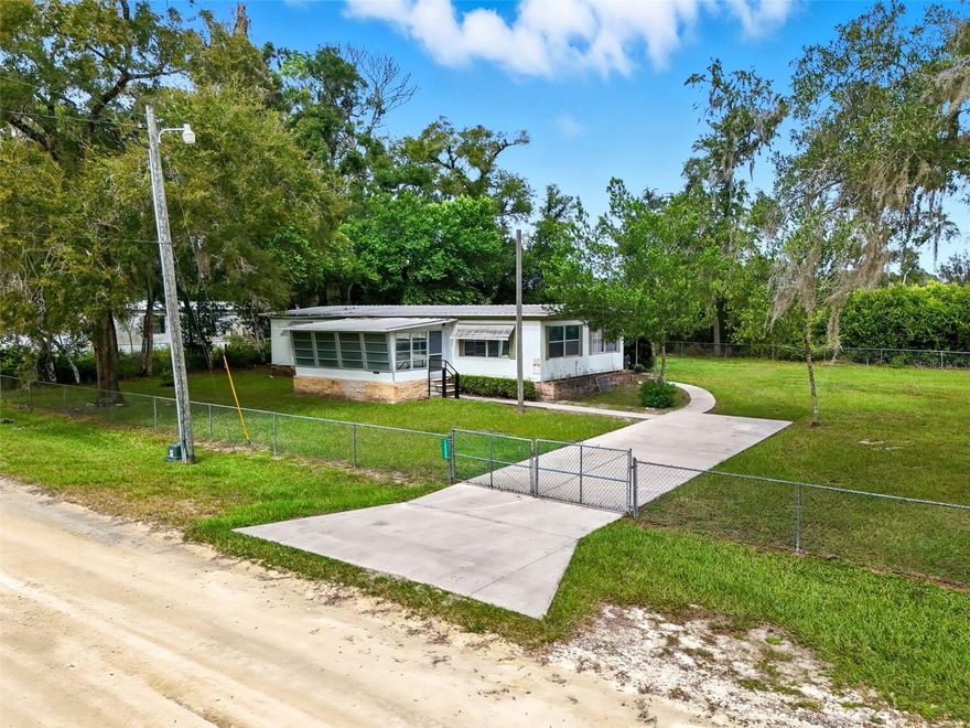 Charming 2,256 SF Property with Owner Financing Available!
This well-maintained 1972 mobile home offers 1,344 square feet of comfortable living space, plus a spacious carport, inviting porch, and convenient laundry area for a total of 2,256 square feet under roof. Enjoy plenty of room for relaxation and entertaining both indoors and out. The covered carport provides ample parking and protection from the elements, while the porch is perfect for morning coffee or evening sunsets. Owner financing is available, making this a great opportunity for buyers seeking flexible terms.  There is a lot with a shed next door also available for purchase as well as a newer mobile home to the east of the shed.