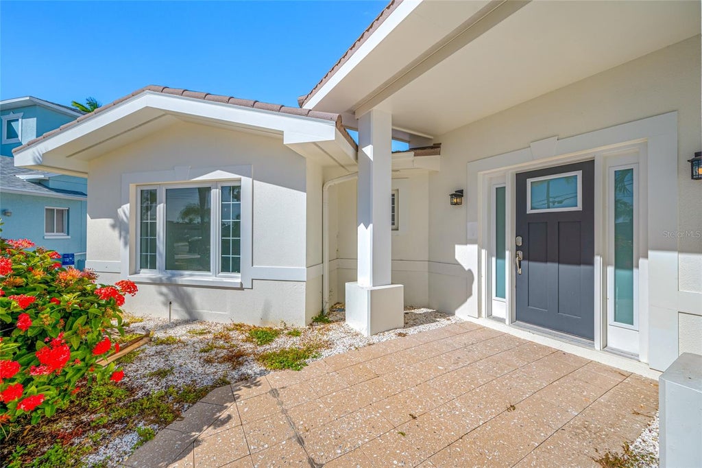 Photo of 600 115th Avenue, Treasure Island, FL 33706 (MLS # TB8553244)