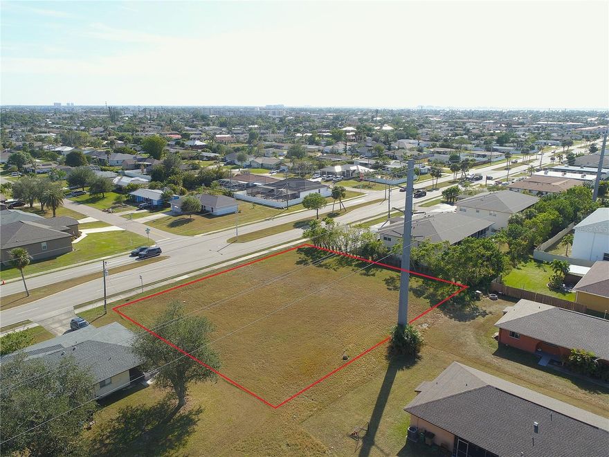 Build-ready 0.46-acre double lot in a prime South Cape Coral location on Santa Barbara Boulevard. Zoned RML, allowing single-family or multifamily development, with city water, sewer, and irrigation already installed. The parcel may be developed as a single site (for example, a six unit building) or split into two 0.23-acre lots, offering flexibility for a range of build strategies. Boundary survey available as is a recent environmental report indicating no protected species or environmental issues on site. Conveniently located near Cape Coral Parkway, shopping, dining, medical facilities, and major corridors, with strong surrounding residential development. AE flood zone. Buyer to verify zoning, density, and permitting requirements.