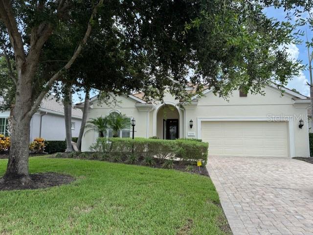 Well maintained 3 Bed 2 Bath Pool home in the sought after gated community of Lakewood Ranch Country Club in The Country Club West subdivision situated amongst lush landscaping in a peaceful setting .
Offered as an Unfurnished Annual Rental. Open floor plan with high ceilings . Subtle touches of rustic charm through-out in the lighting, fans and fixtures.
Upgraded appliances, including a gas stove and stainless appliances .The open Great Room has space for a separate Dining space ,Family Room and a eating area next to the Kitchen .The large sliding doors (with remote shades) showcase the outdoor space and the beautiful heated pool with a waterfall feature settled amongst a preserve- like setting and pond views. Split bedrooms with 2 in the front with shared guest bath and the Master Suite situated in the back for privacy. The Master offers a large en-suite bath with double sinks and a big ,open walk-in shower. The master closet has beautiful custom wood built- ins. A Laundry Room and 2 car garage complete this home. 1 small pet is allowed at the owners discretion with a non-refundable pet fee. Landscaping and Pool maintenance is included.